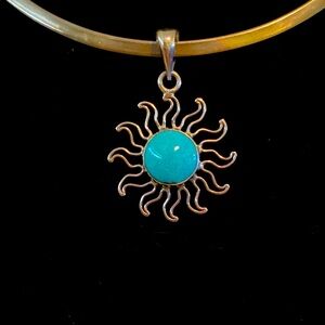Charles Albert Sterling Silver and Blue Sunburst Pendant